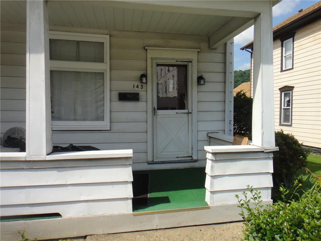 145 Main Street New Eagle, PA 15067 - Photo 2 of 24 a view of front door of house with stairs