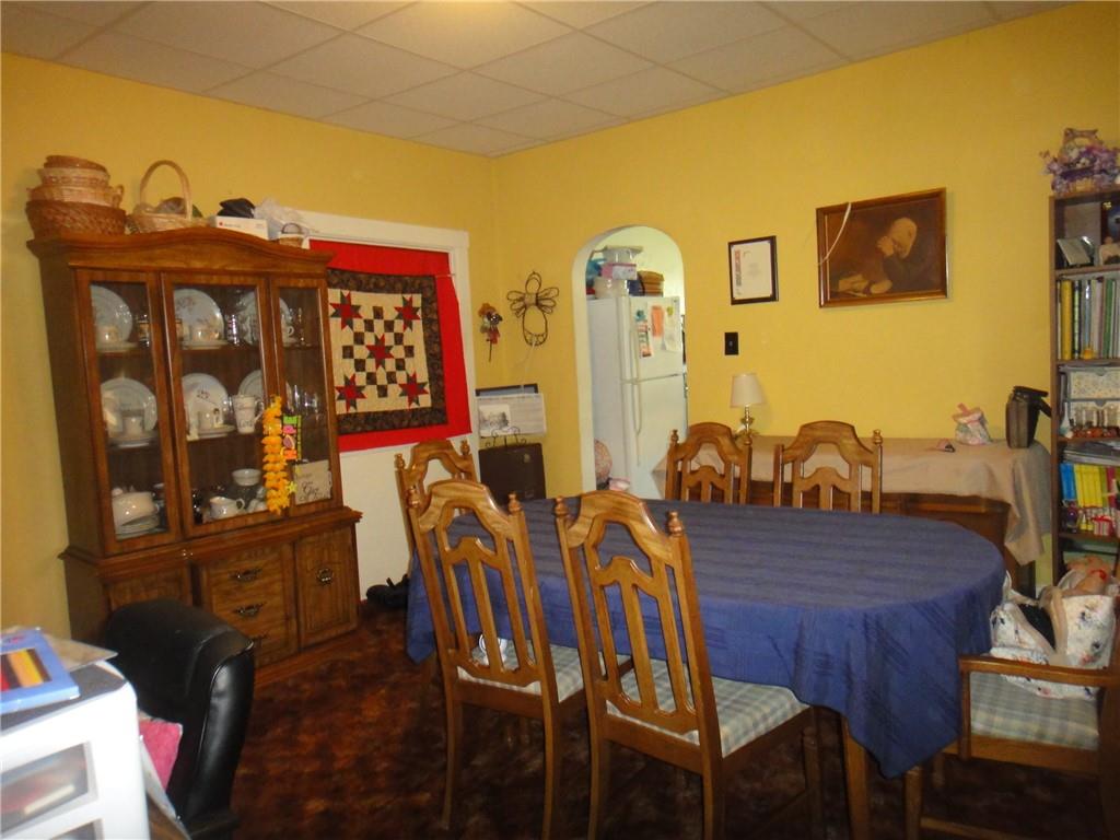 145 Main Street New Eagle, PA 15067 - Photo 4 of 24 a view of a dining room with furniture and wooden floor