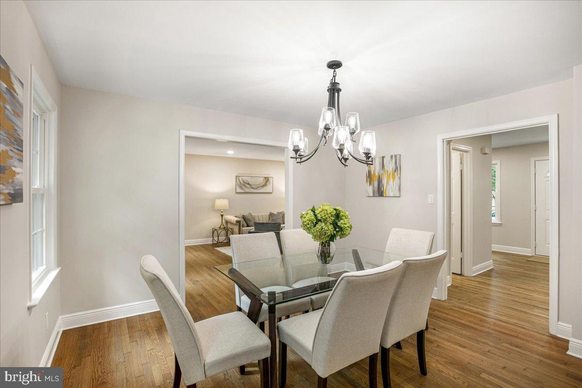 11603 Virgate Lane Reston, VA 20191 - Photo 16 of 59 Bright dining space with elegant lighting.