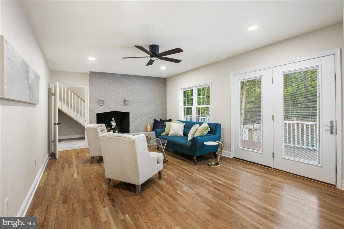 11603 Virgate Lane Reston, VA 20191 - Photo 18 of 59 Family room with woodburning fireplace