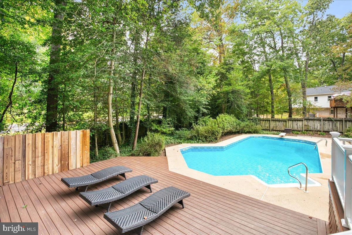 11603 Virgate Lane Reston, VA 20191 - Photo 54 of 59 Serene backyard oasis with inviting pool.