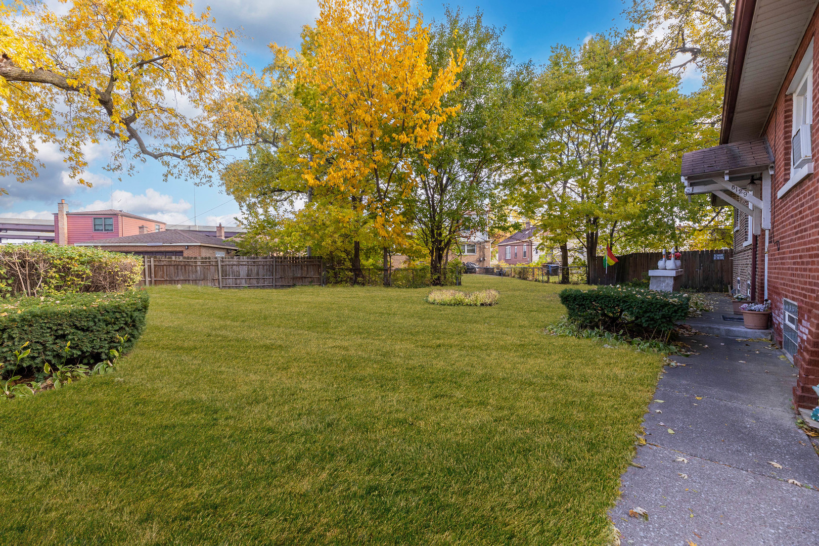 8129 South Cornell Avenue Chicago, IL 60617 - Photo 4 of 21 a view of a park with large trees