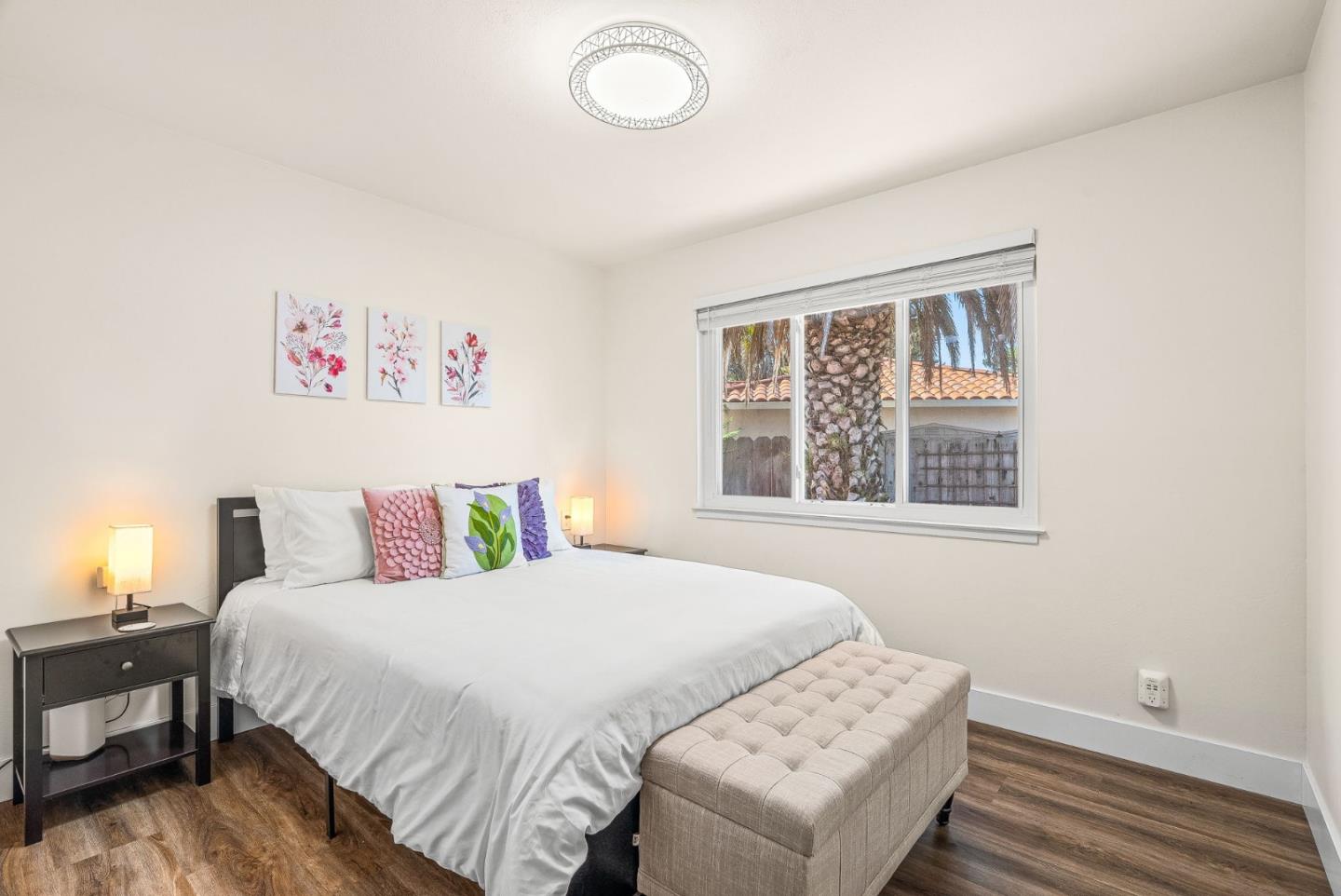 26372 Riverside Place Carmel, CA 93923 - Photo 13 of 35 a bedroom with a bed and a window