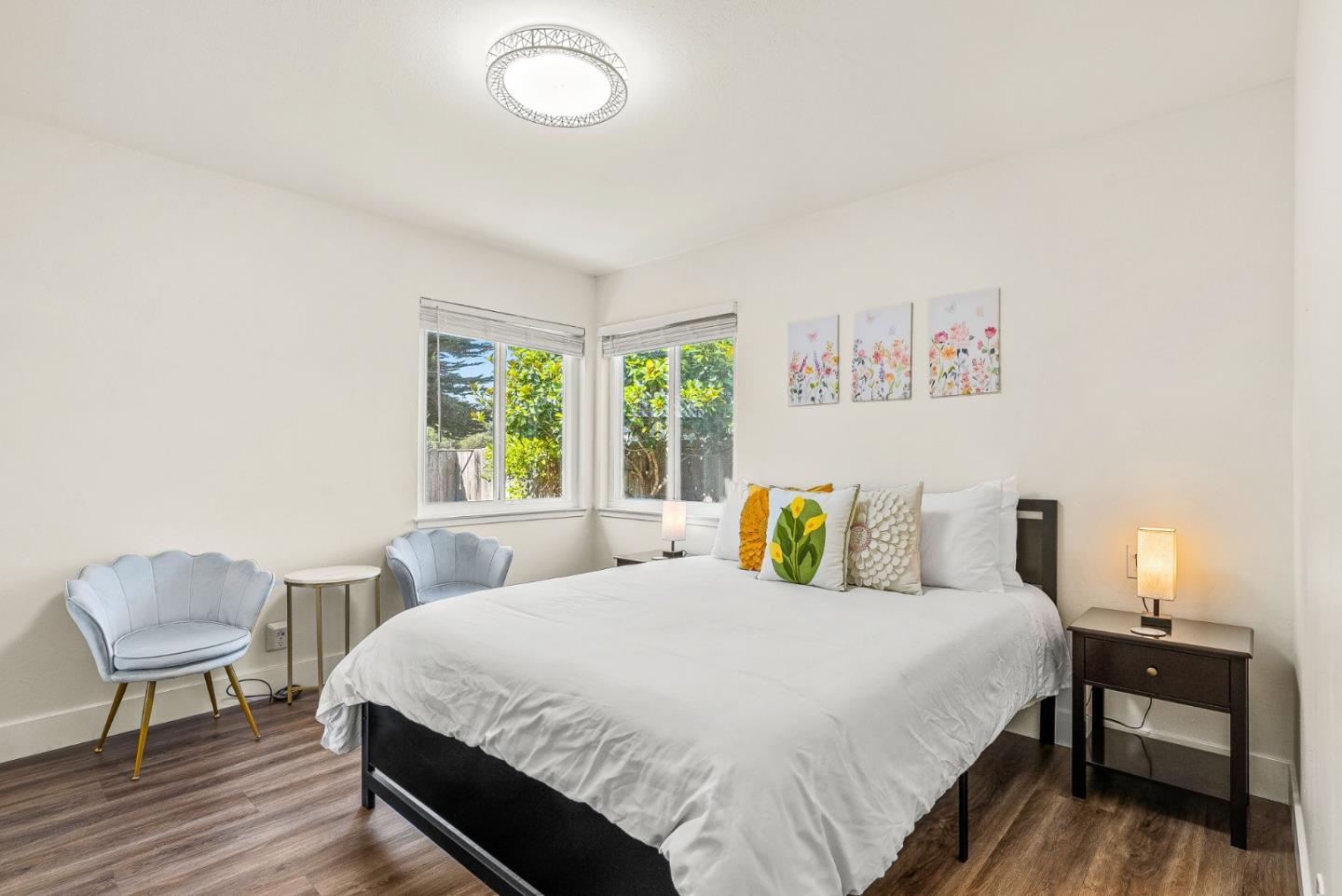 26372 Riverside Place Carmel, CA 93923 - Photo 15 of 35 a bedroom with a bed and chair