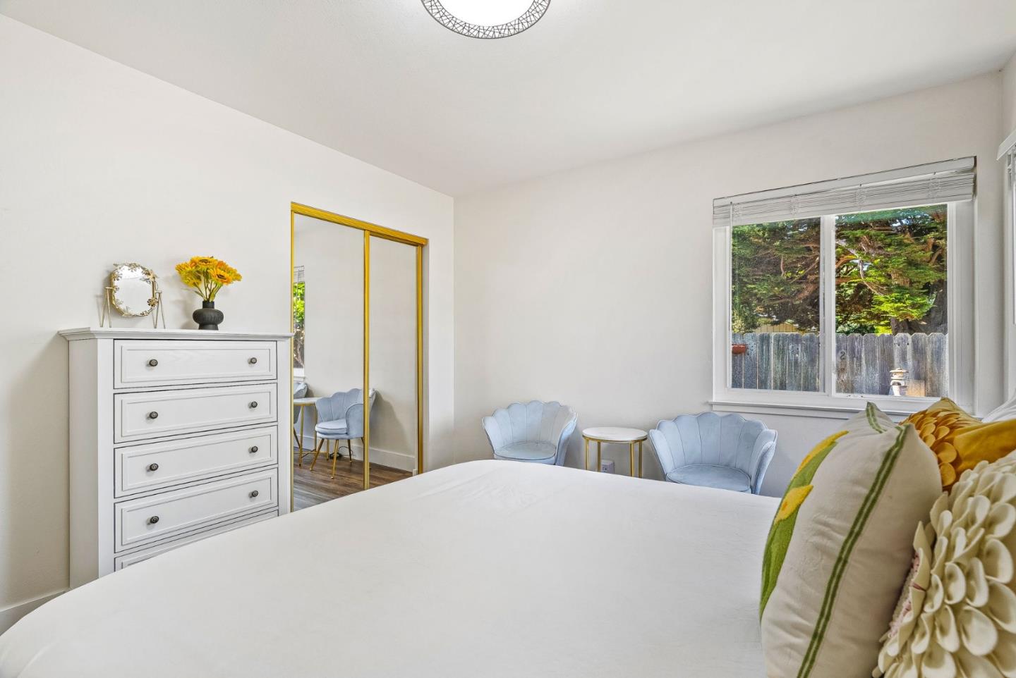 26372 Riverside Place Carmel, CA 93923 - Photo 16 of 35 a bedroom with a bed and with furniture