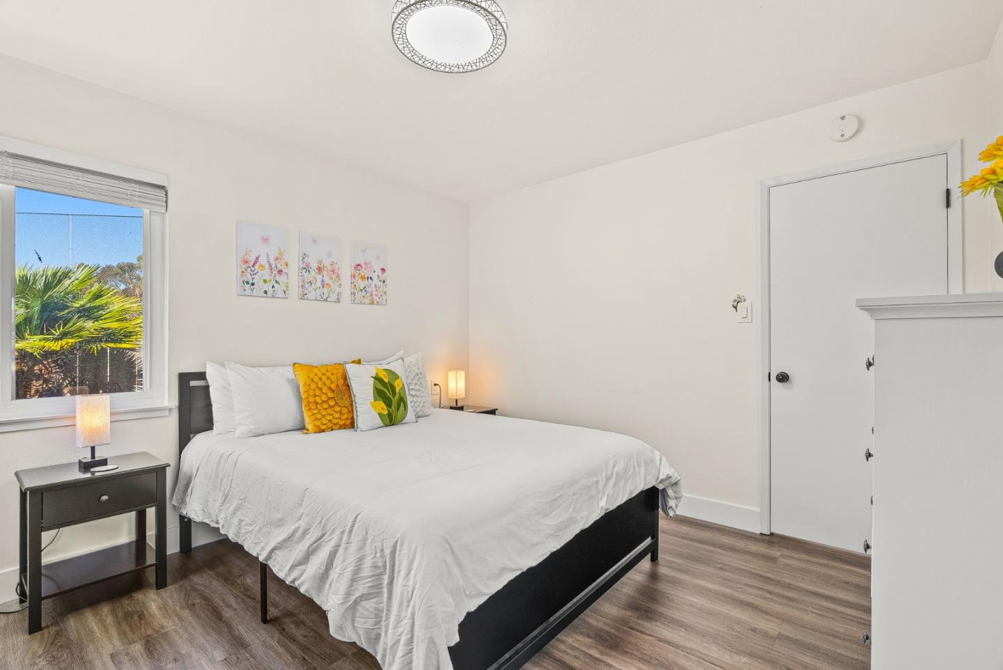 26372 Riverside Place Carmel, CA 93923 - Photo 17 of 35 a bedroom with a bed and a table