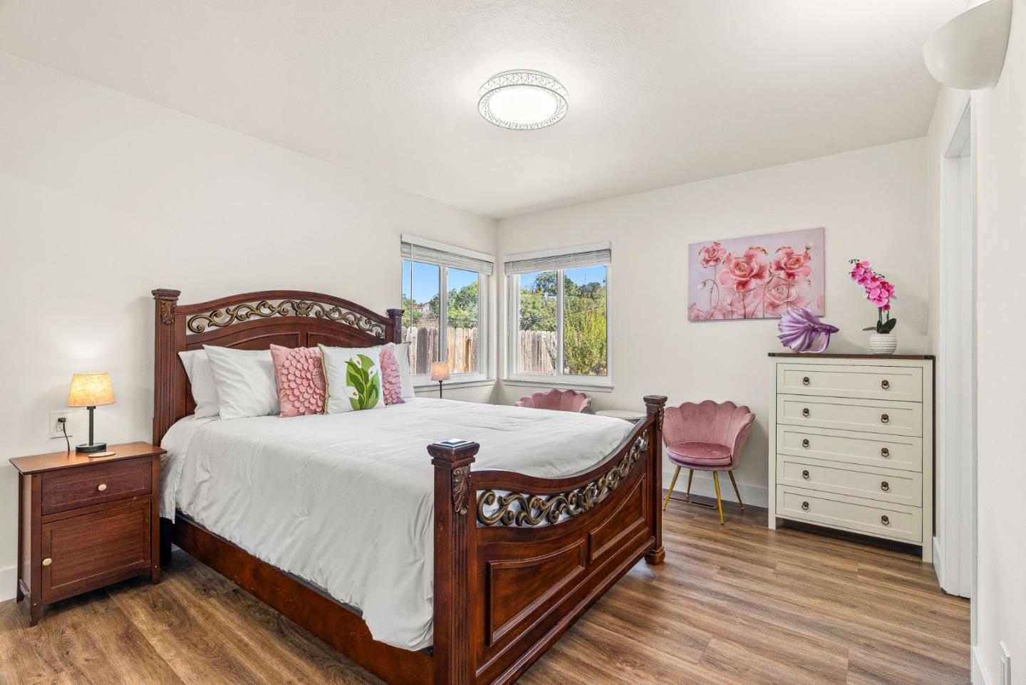 26372 Riverside Place Carmel, CA 93923 - Photo 18 of 35 a bedroom with a bed and a dresser