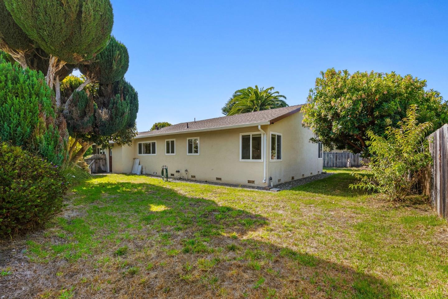 26372 Riverside Place Carmel, CA 93923 - Photo 23 of 35 a view of a house with backyard and sitting area