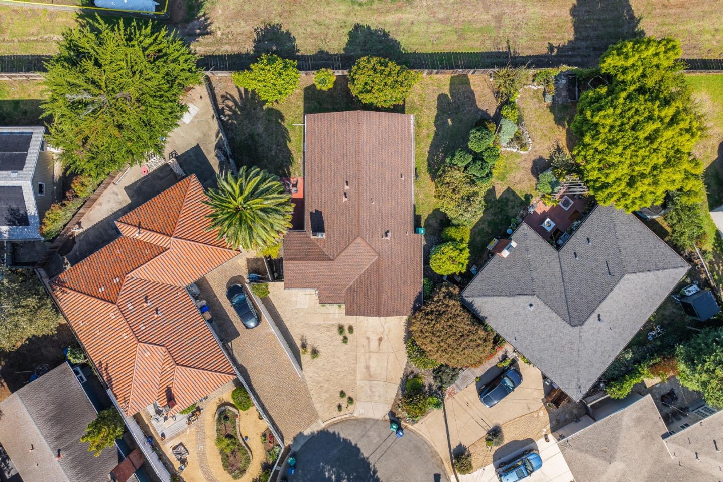 26372 Riverside Place Carmel, CA 93923 - Photo 25 of 35 an aerial view of a house with a yard and garden