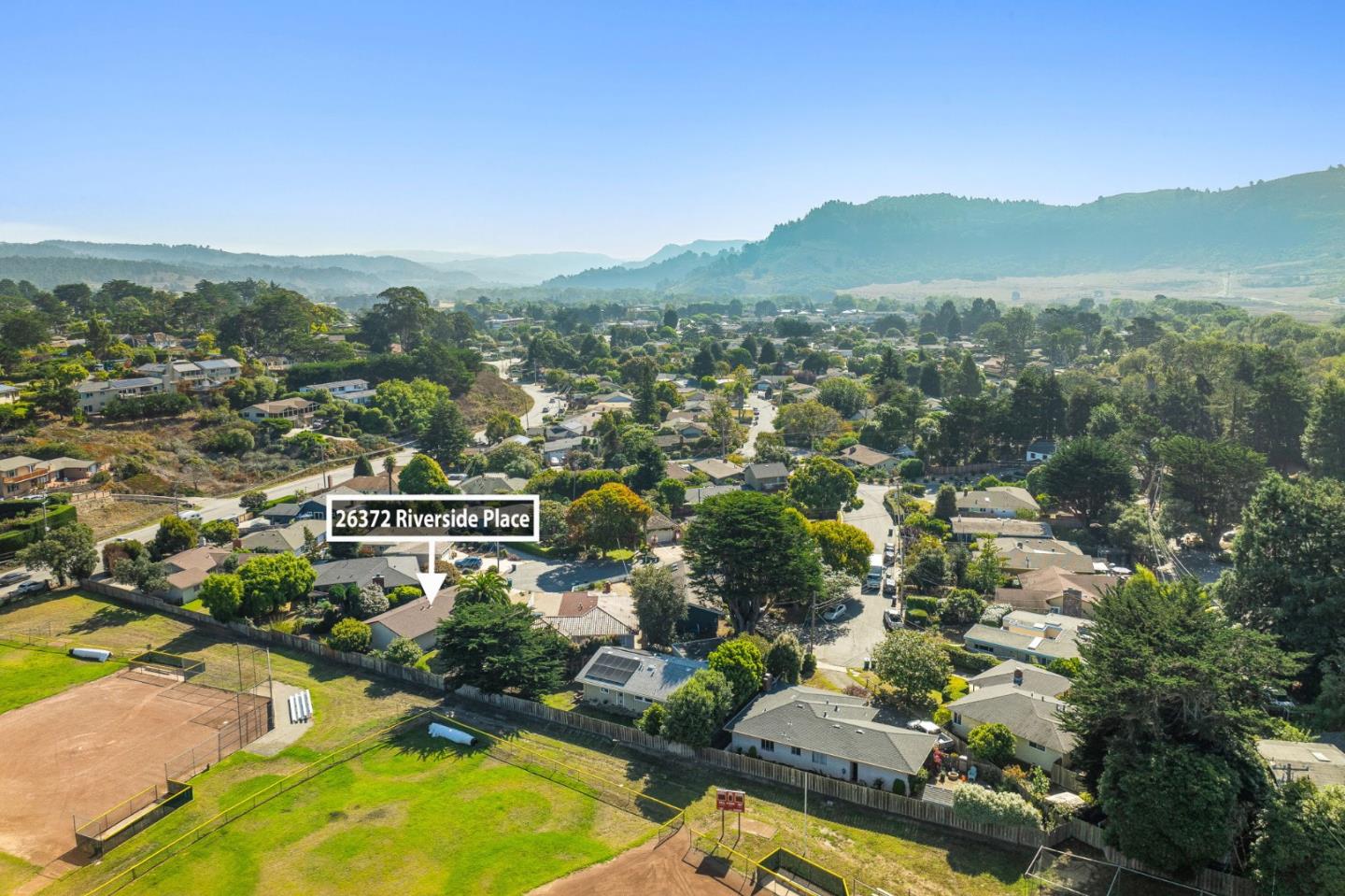26372 Riverside Place Carmel, CA 93923 - Photo 27 of 35 an aerial view of residential houses with outdoor space and trees