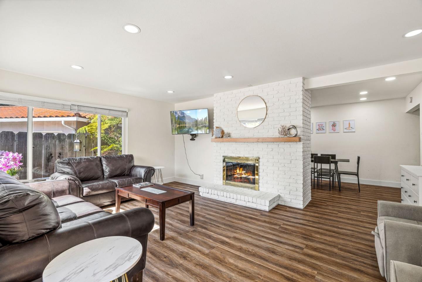 26372 Riverside Place Carmel, CA 93923 - Photo 4 of 35 a living room with furniture and a fireplace