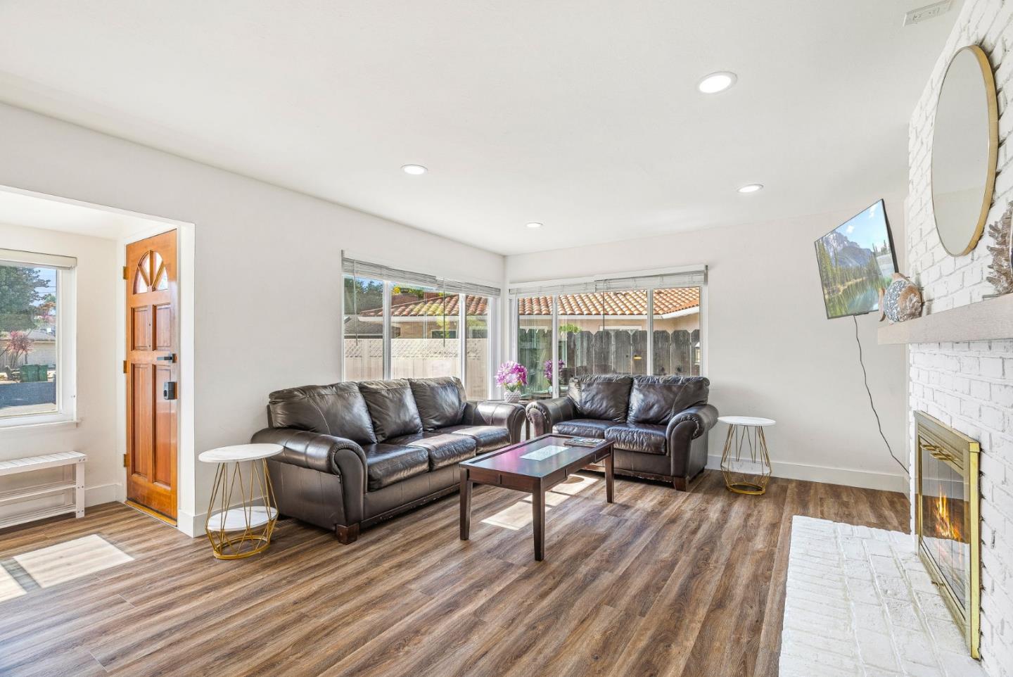 26372 Riverside Place Carmel, CA 93923 - Photo 6 of 35 a living room with furniture and a wooden floor