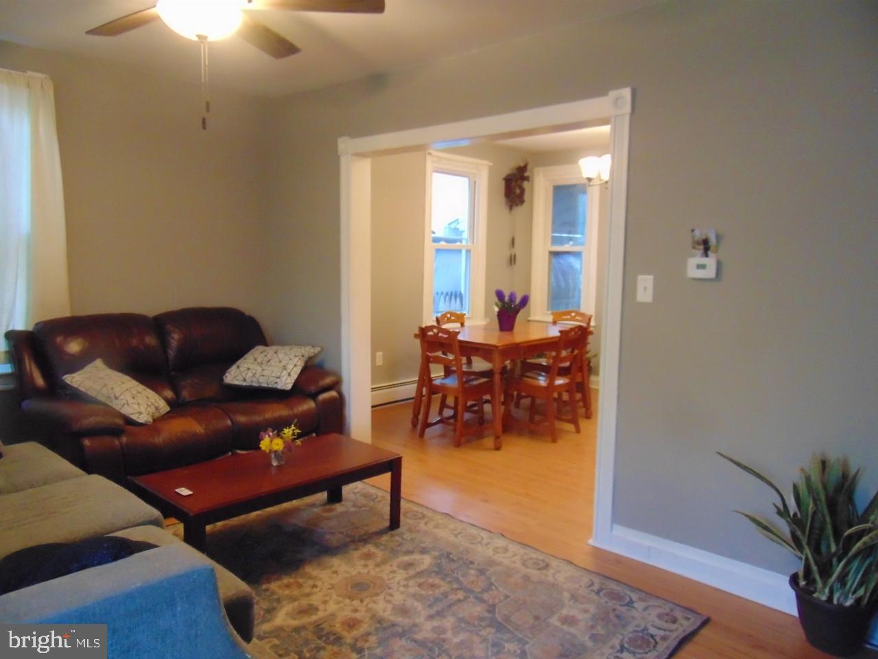21 West Smith Street Topton, PA 19562 - Photo 11 of 31 a living room with furniture and a potted plant