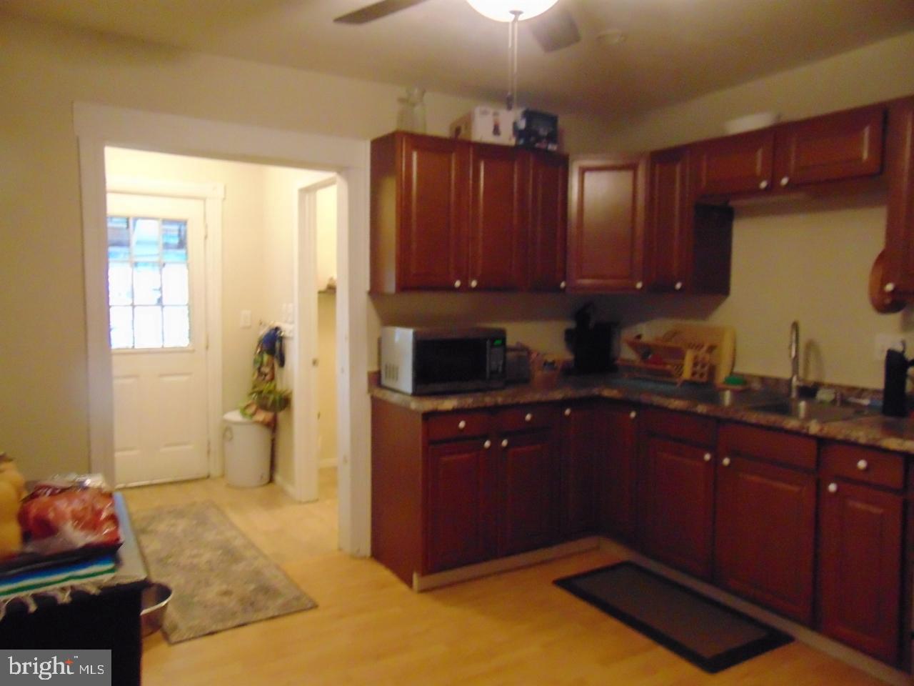 21 West Smith Street Topton, PA 19562 - Photo 19 of 31 a kitchen with a sink and cabinets