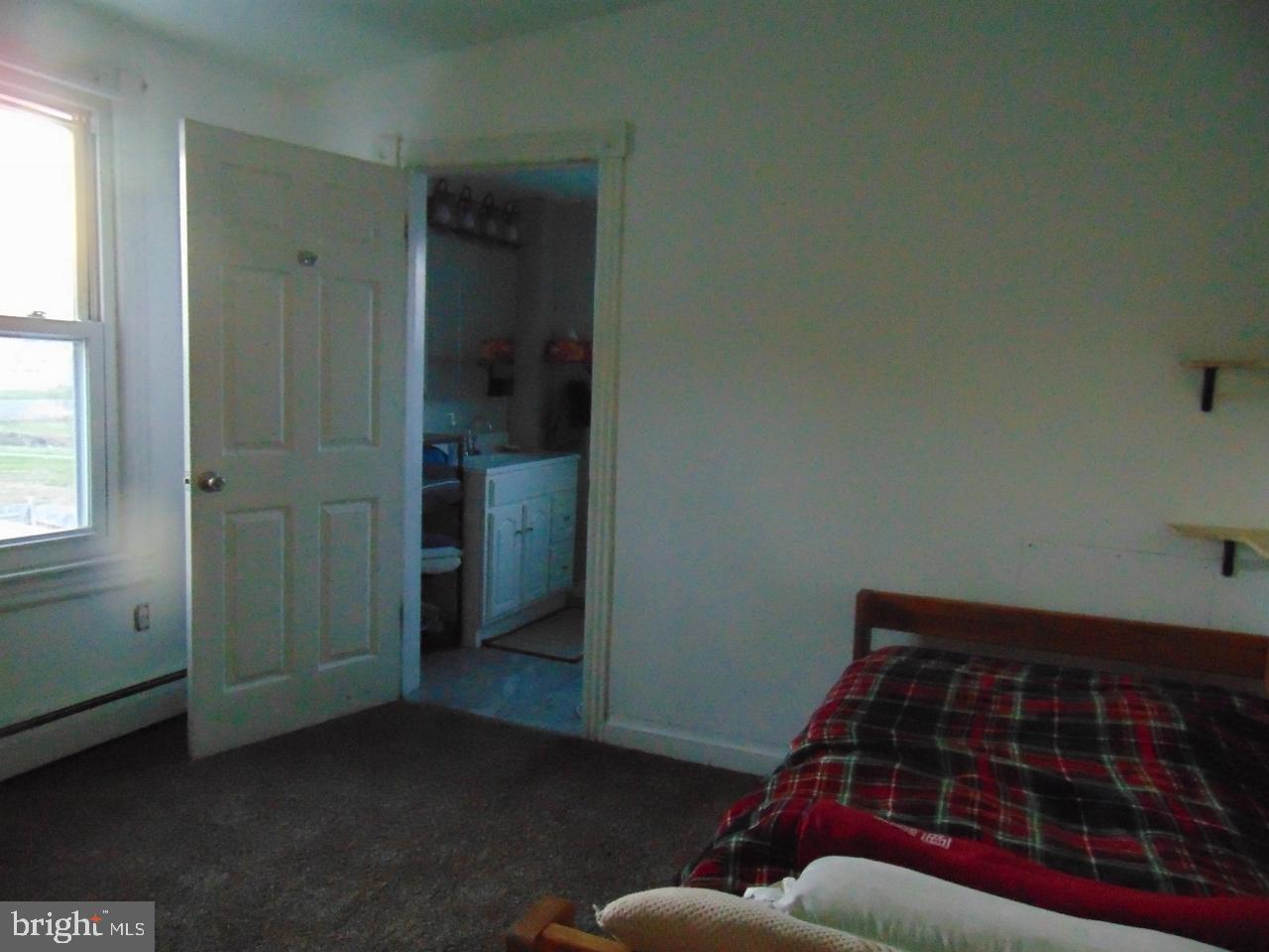 21 West Smith Street Topton, PA 19562 - Photo 31 of 31 a bedroom with a bed and a window