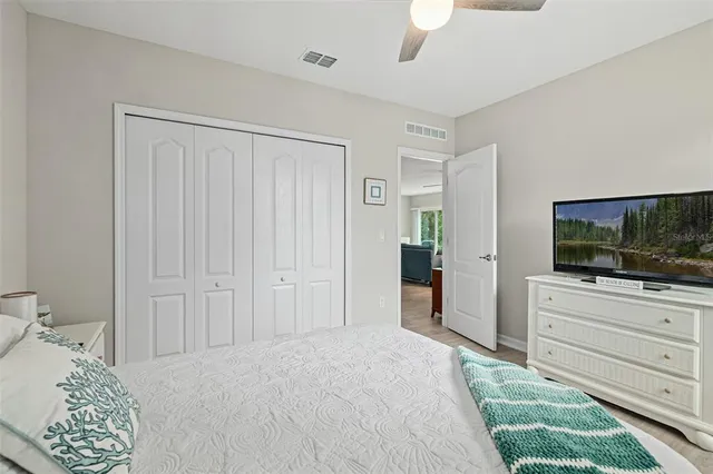 a room with a bed and a television in it