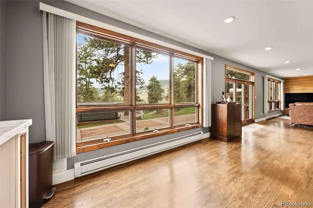 a view of room with floor to ceiling window and an outdoor view
