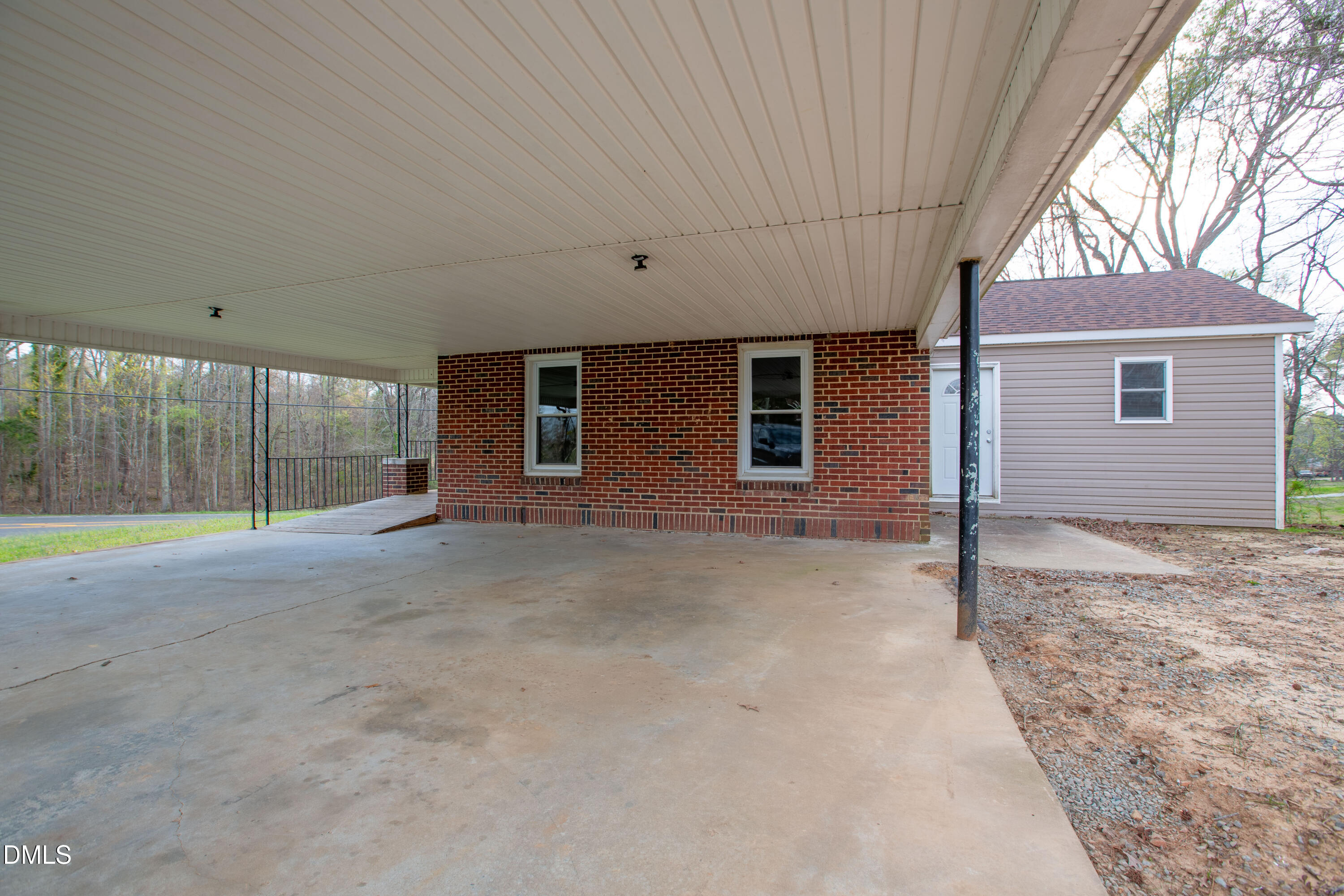 4295 Virgilina Road Roxboro, NC 27574 - Photo 30 of 46 a view of an house with backyard and garden