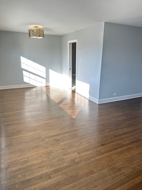 8849 North Wisner Street, Unit 1 Niles, IL 60714 - Photo 10 of 15 a view of a hallway with wooden floor