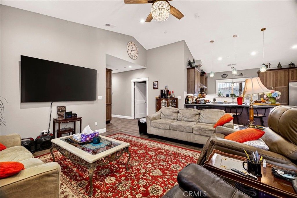 603 Zink Road Berry Creek, CA 95916 - Photo 13 of 69 a living room with furniture and a flat screen tv