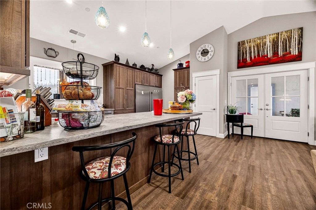 603 Zink Road Berry Creek, CA 95916 - Photo 17 of 69 a open kitchen with stainless steel appliances granite countertop a stove and cabinets
