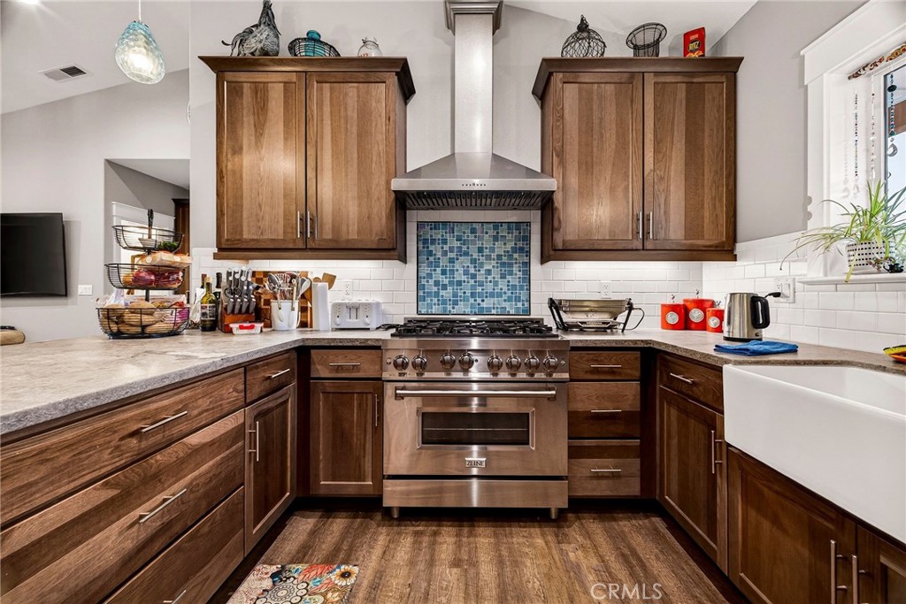 603 Zink Road Berry Creek, CA 95916 - Photo 19 of 69 a kitchen with stainless steel appliances granite countertop a stove and a sink