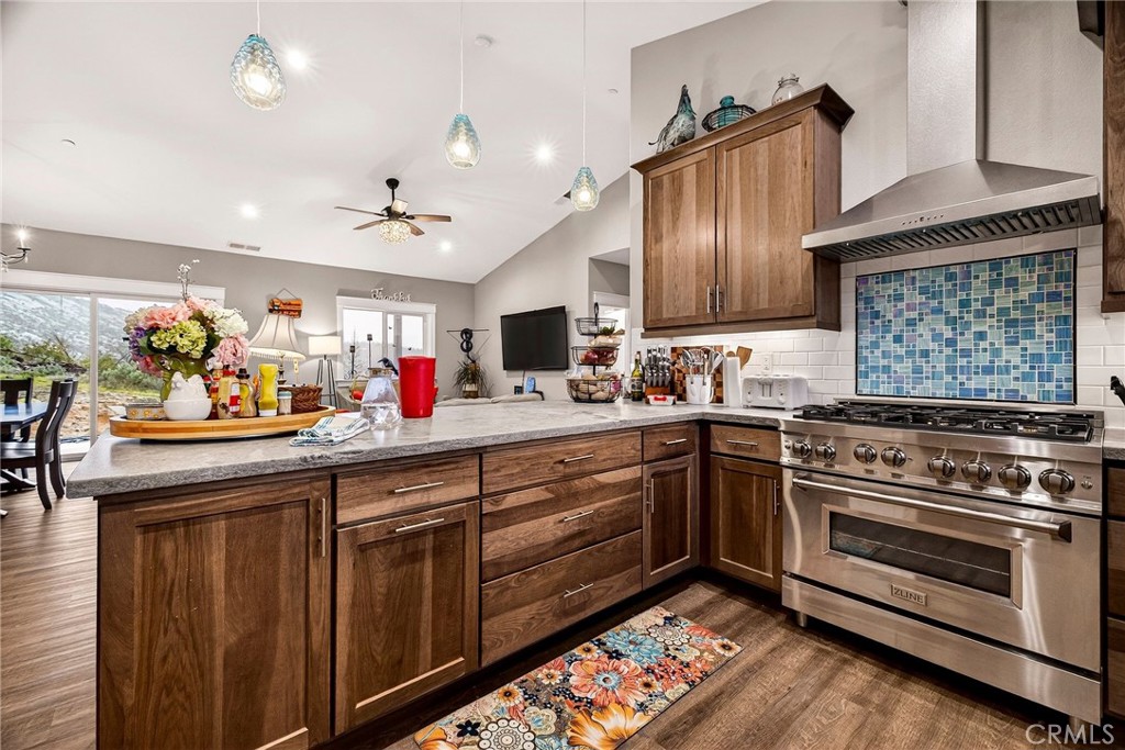 603 Zink Road Berry Creek, CA 95916 - Photo 20 of 69 a kitchen with stainless steel appliances granite countertop a stove and cabinets