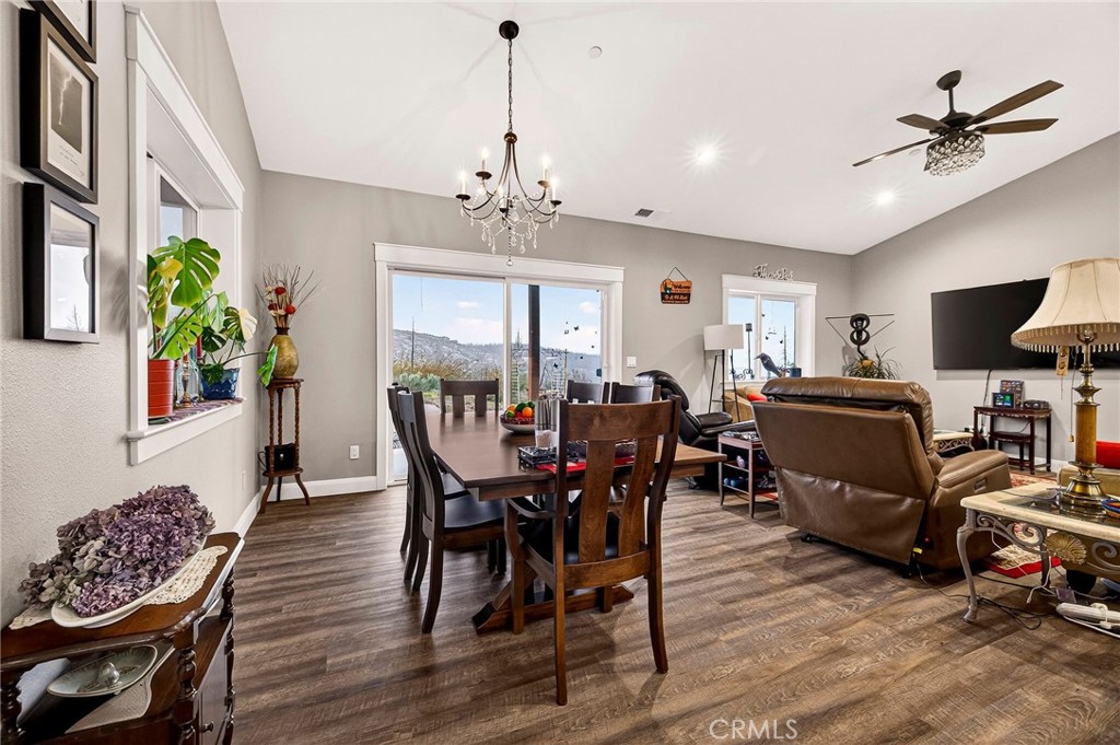 603 Zink Road Berry Creek, CA 95916 - Photo 22 of 69 a view of a dining room with furniture and chandelier