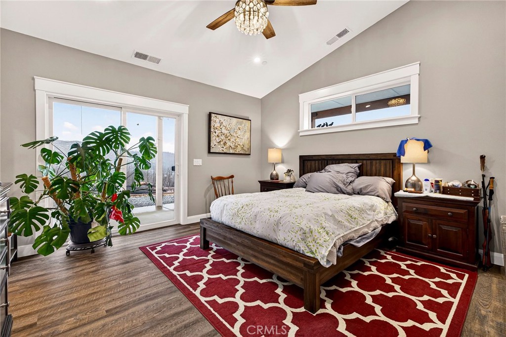 603 Zink Road Berry Creek, CA 95916 - Photo 26 of 69 a bedroom with a bed and a potted plant