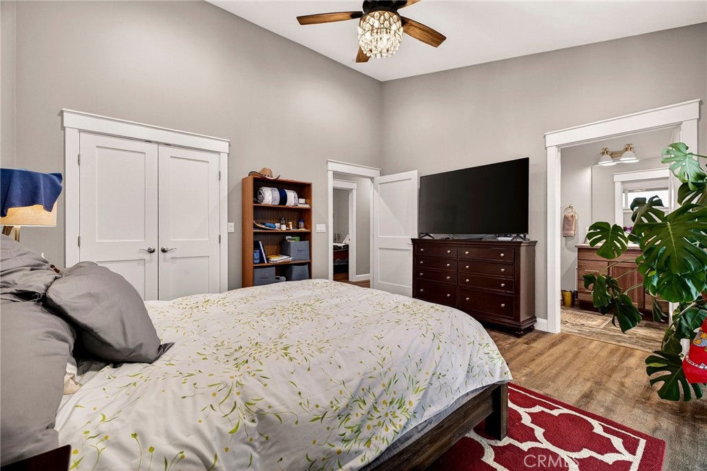 603 Zink Road Berry Creek, CA 95916 - Photo 29 of 69 a bedroom with a bed and a flat screen tv