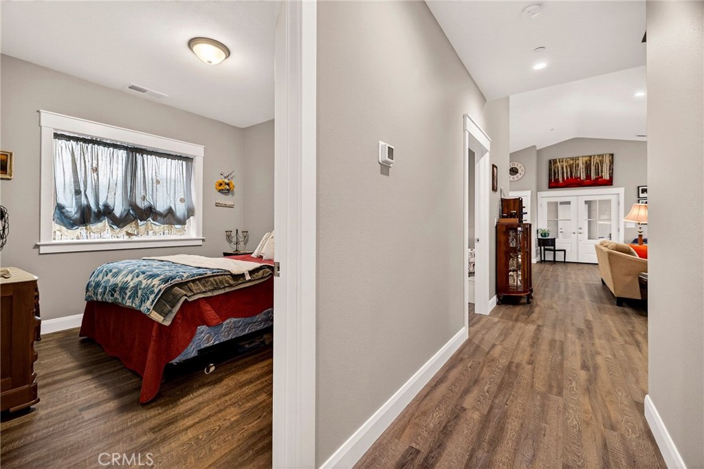 603 Zink Road Berry Creek, CA 95916 - Photo 34 of 69 a bedroom with a bed and a window