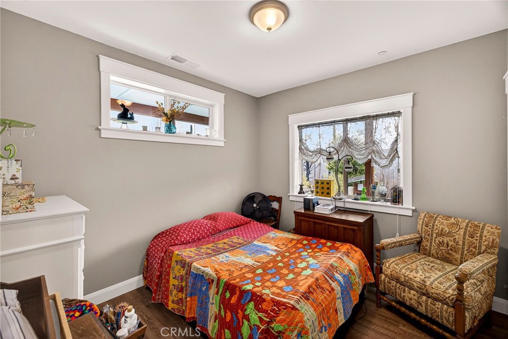 603 Zink Road Berry Creek, CA 95916 - Photo 43 of 69 a bedroom with a bed and a couch