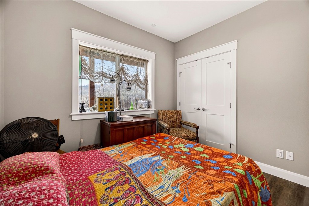 603 Zink Road Berry Creek, CA 95916 - Photo 46 of 69 a bedroom with a bed and a window