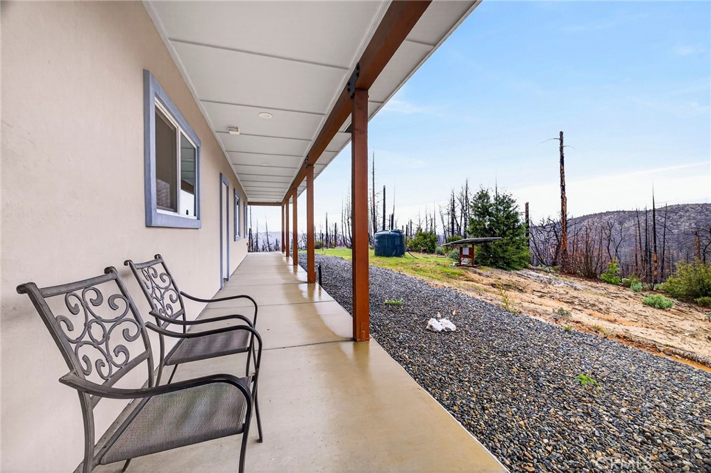603 Zink Road Berry Creek, CA 95916 - Photo 54 of 69 a view of a porch with furniture and garden