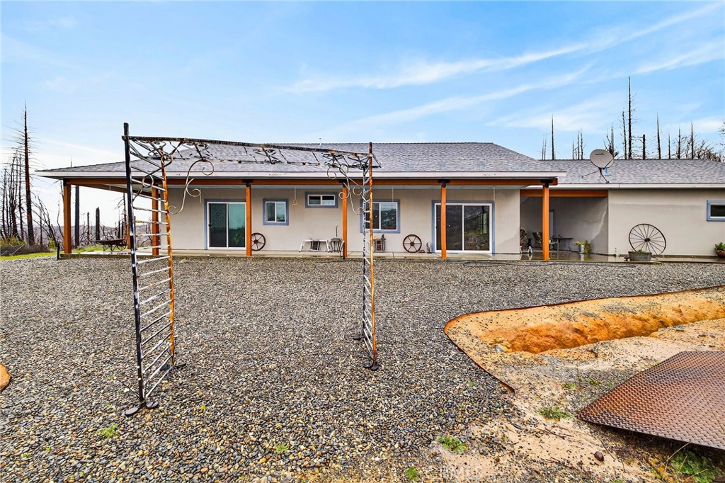 603 Zink Road Berry Creek, CA 95916 - Photo 56 of 69 a front view of a house with garden