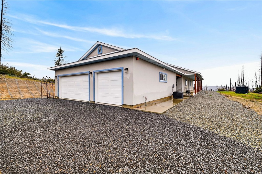 603 Zink Road Berry Creek, CA 95916 - Photo 6 of 69 a view of a house with a backyard
