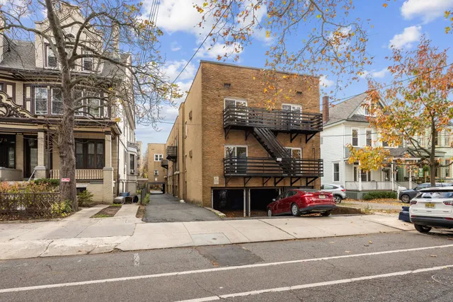 a view of a building with a street