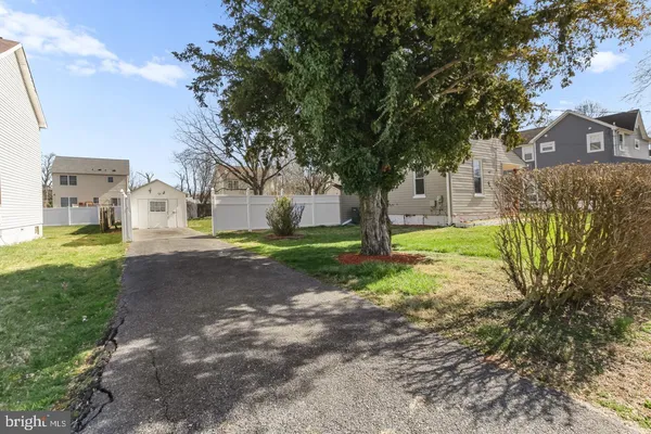 a house with garden in front of it