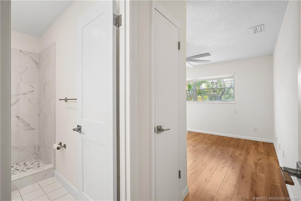 2929 Southeast Ocean Boulevard, Unit 1087 Stuart, FL 34996 - Photo 12 of 21 a view of bathroom with shower