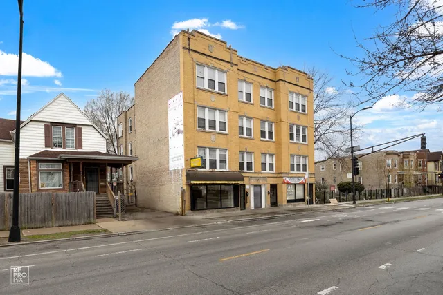 a view of a building with a street