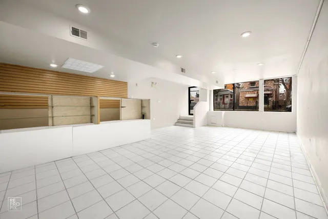 a large white room with mirror