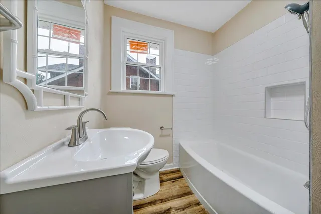 a bathroom with a sink and a bathtub