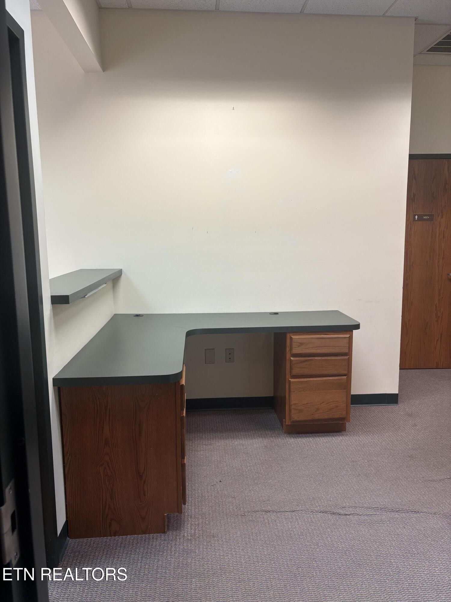 2909 Decatur Highway Kingston, TN 37763 - Photo 7 of 16 a room with a table and a cabinet