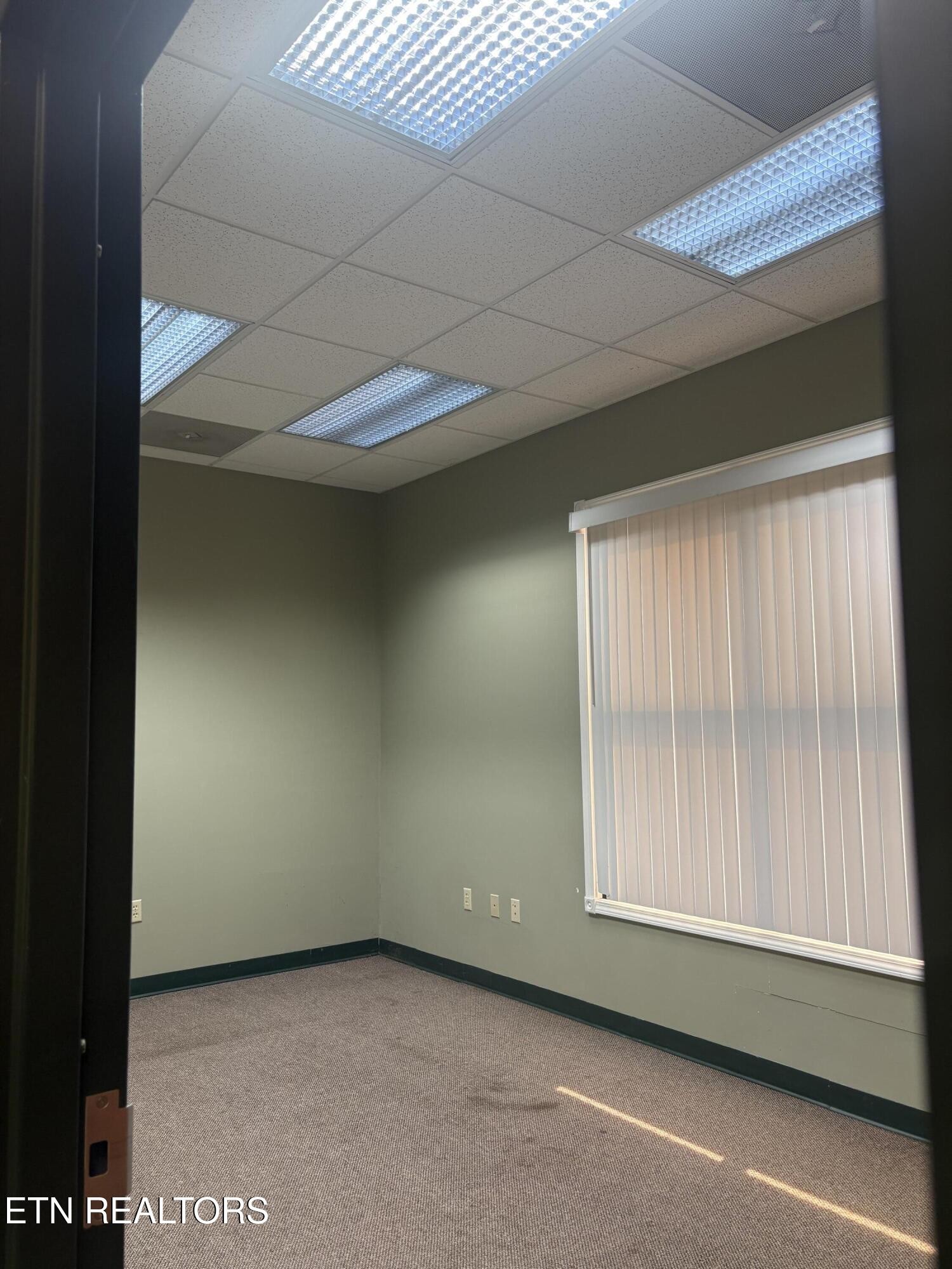 2909 Decatur Highway Kingston, TN 37763 - Photo 8 of 16 a view of an empty room with a window