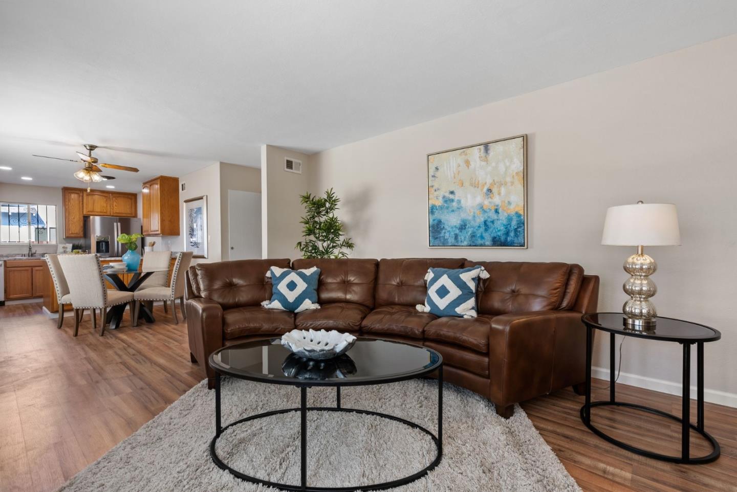 254 Uvas Street Milpitas, CA 95035 - Photo 16 of 48 a living room with furniture and a lamp