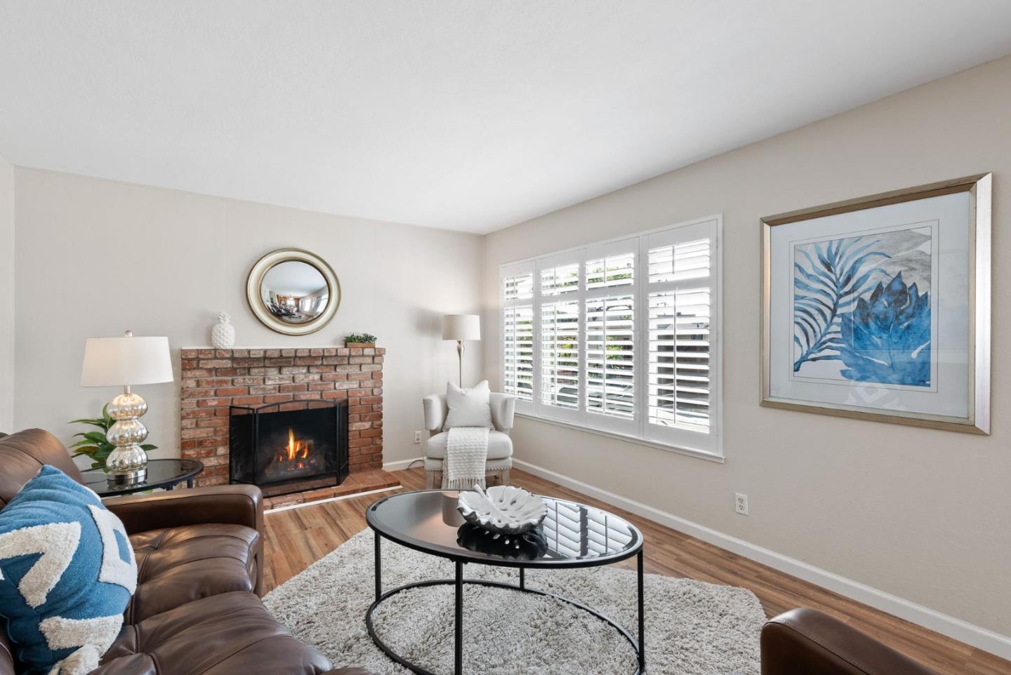 254 Uvas Street Milpitas, CA 95035 - Photo 17 of 48 a living room with furniture and a fireplace