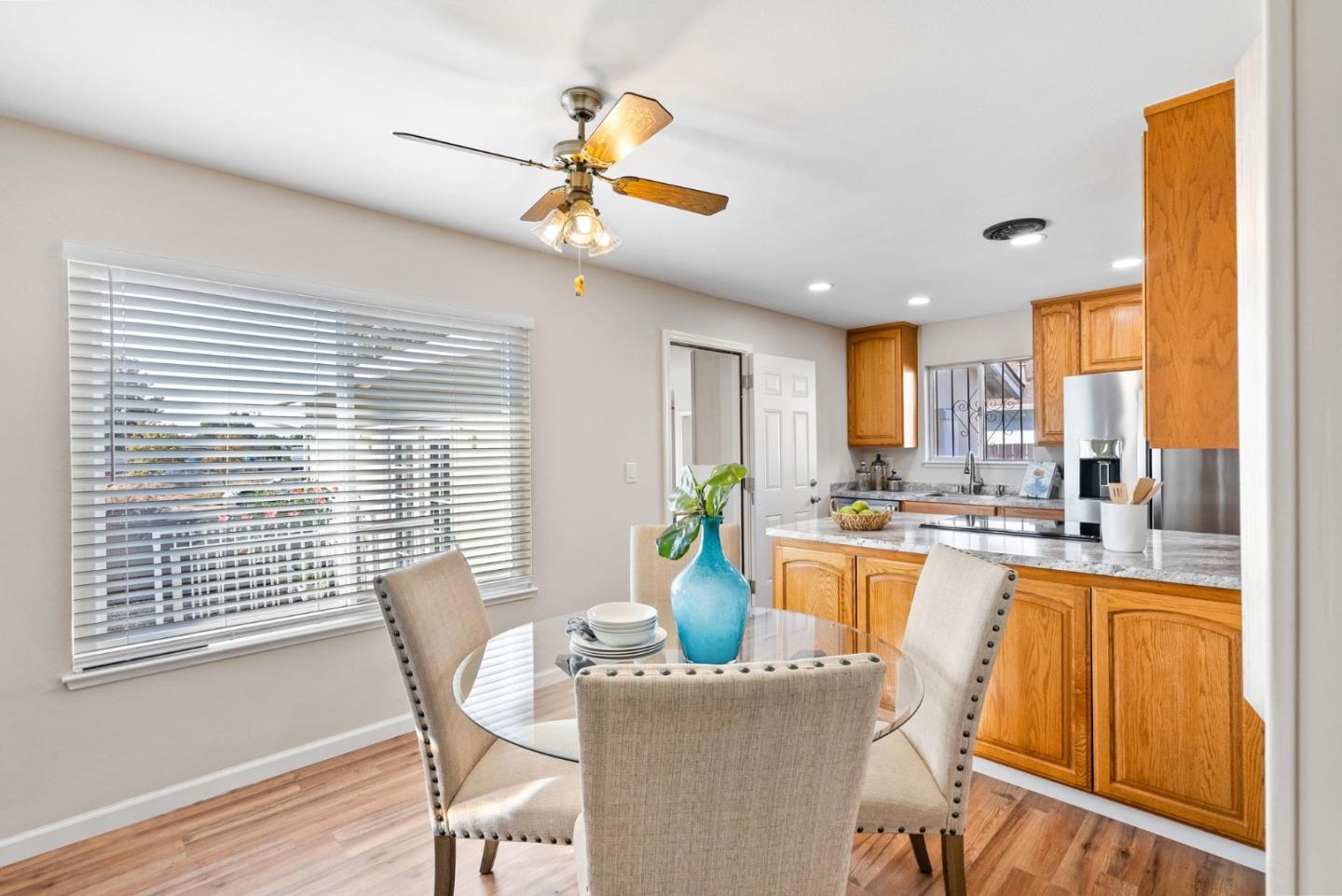 254 Uvas Street Milpitas, CA 95035 - Photo 21 of 48 a view of a dining room with furniture window and outside view