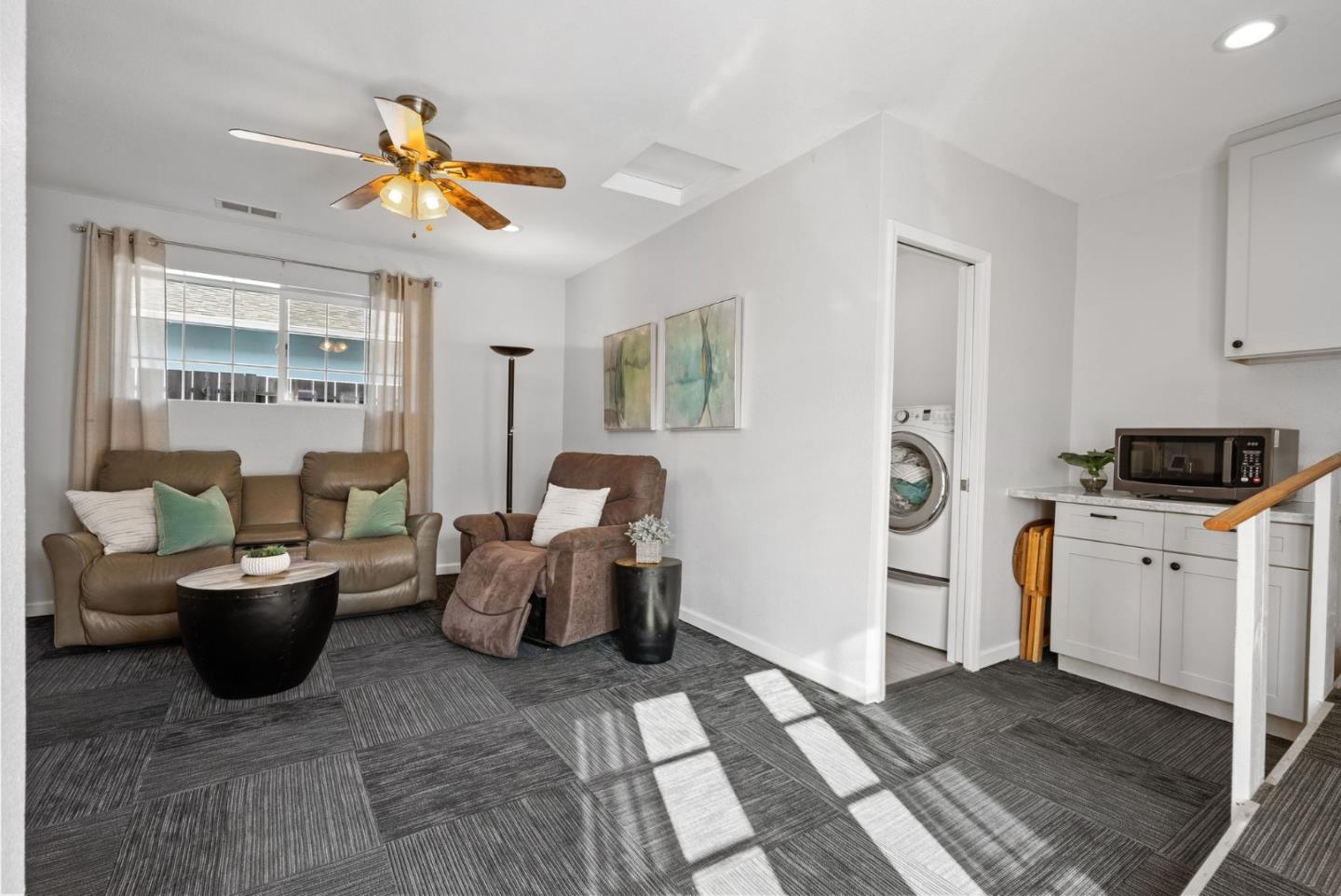 254 Uvas Street Milpitas, CA 95035 - Photo 26 of 48 a living room with furniture a window and a chandelier