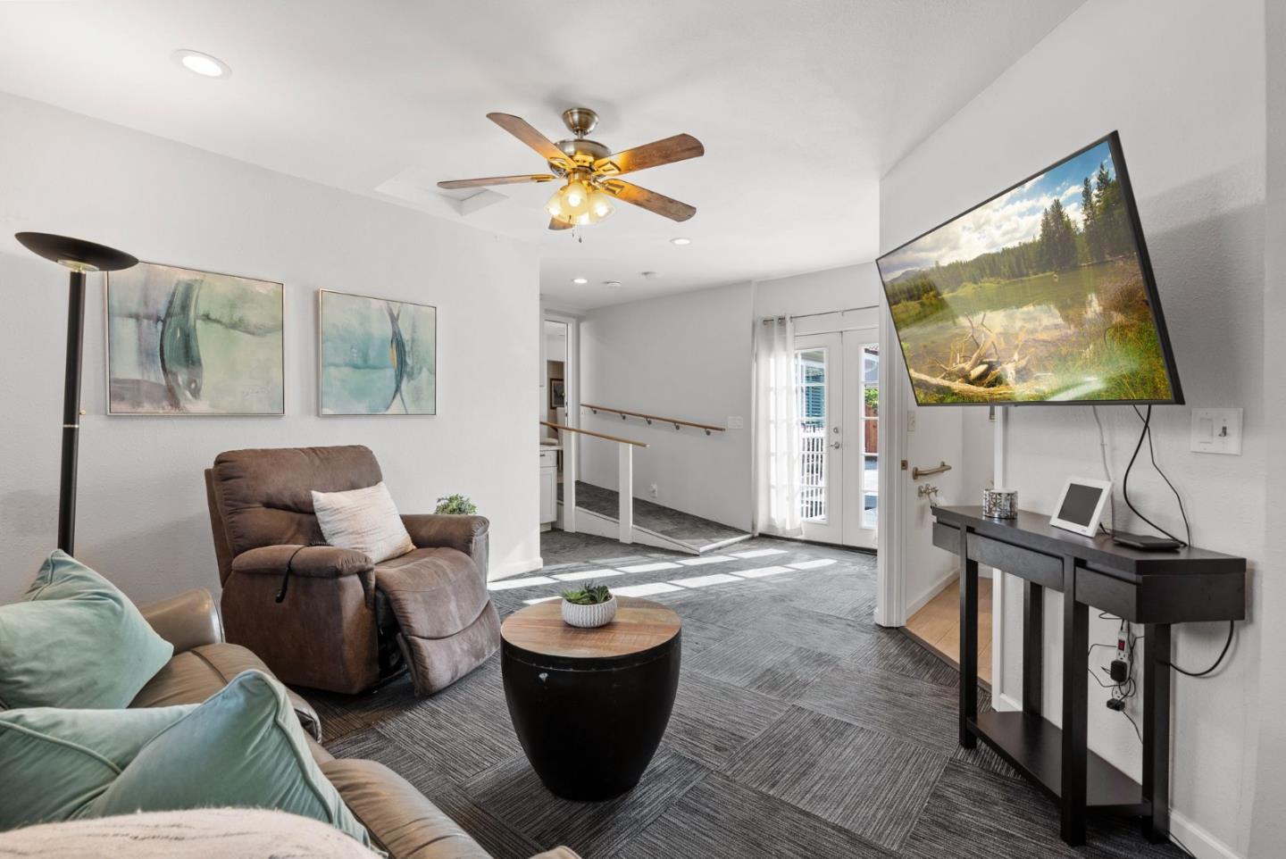 254 Uvas Street Milpitas, CA 95035 - Photo 27 of 48 a living room with furniture and a flat screen tv