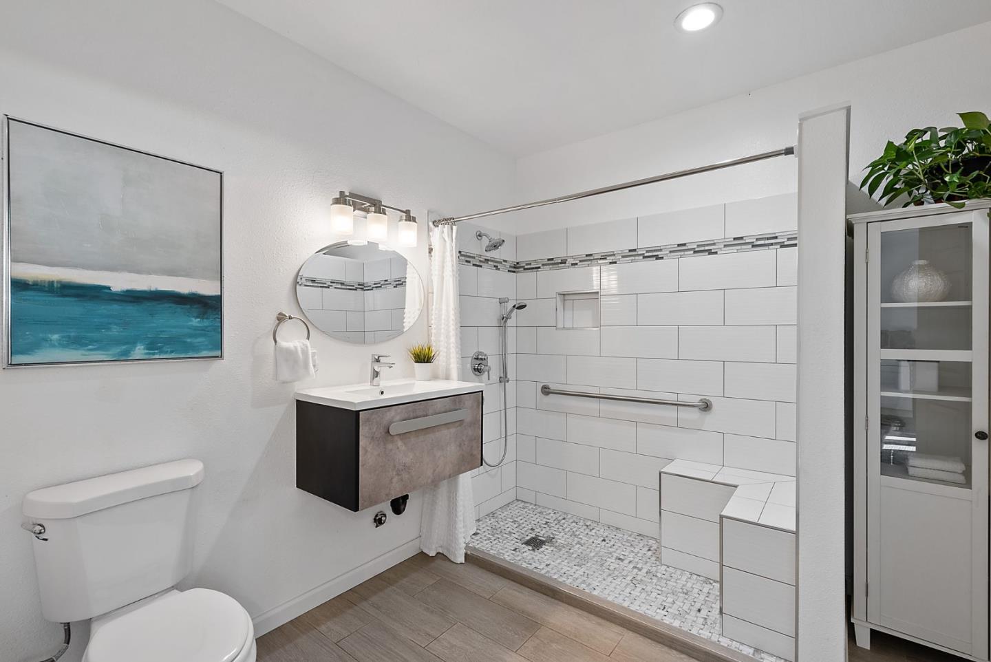 254 Uvas Street Milpitas, CA 95035 - Photo 28 of 48 a bathroom with a sink toilet and shower